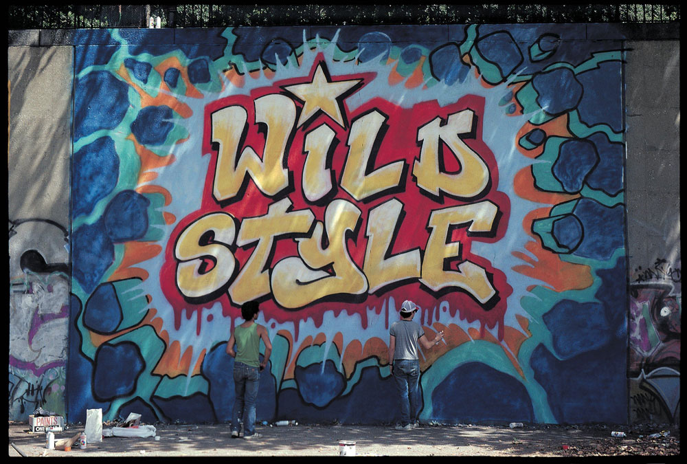 Sharp and Revolt finish the Wild Style mural, 1983. Photo © Martha Cooper.