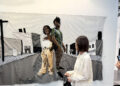 Kandy G Lopez, "TAYINA & JORDAN," Yarn and repurposed clothing 90 x 150 in, 228.6 x 381 cm