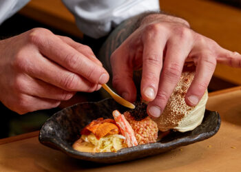 Chef Kevin plating the Kegani, hairy horse crab from Hokkaido